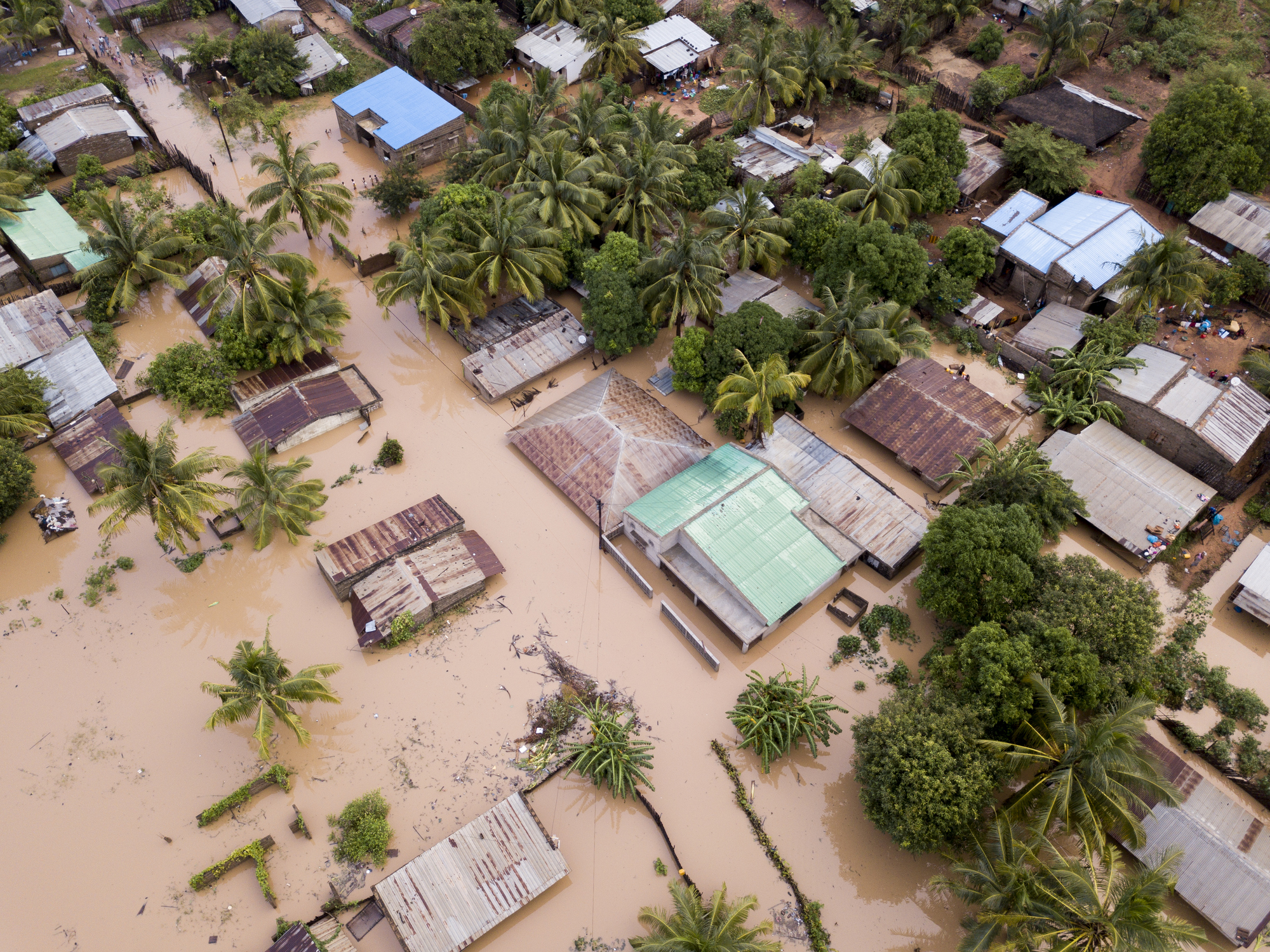 Aerial view overhead flooded houses after a cyclone and rain