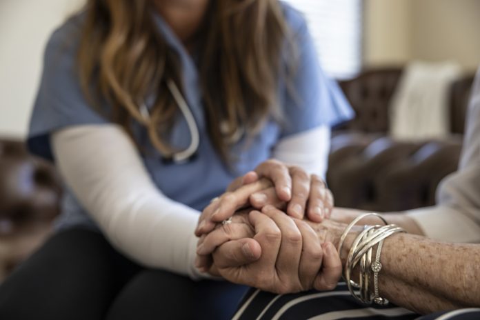 nurse with ageing patient