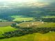 Aerial view of green field, position point and boundary line to show location and area. A tract of land for owned, sale, development, rent, buy or investment.