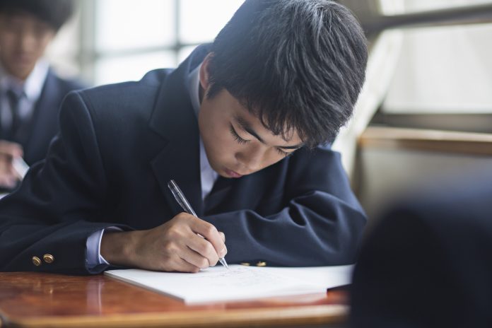 Japanese student boy at the school