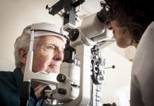 Optometrist with patient