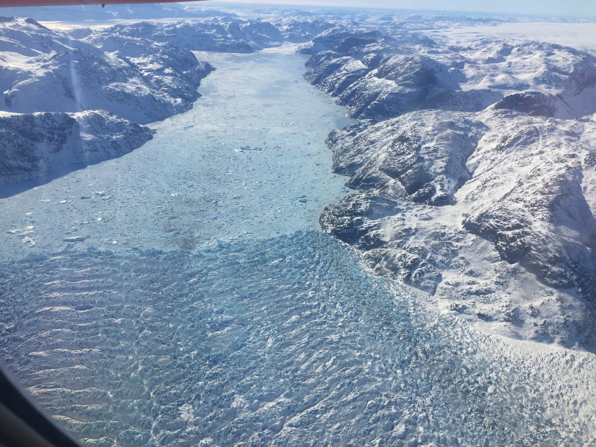 Glacier Calving into a lake/reservoir, credit: Claus Andersen-Aagaard.