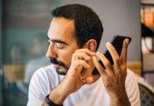 Blind man using technology