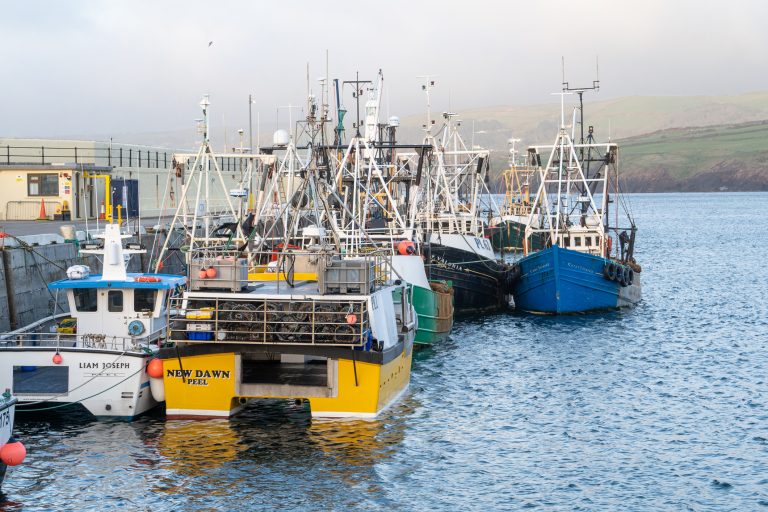 Peel, Isle of Man: Fishing boats moored at the pier in the town of Pel