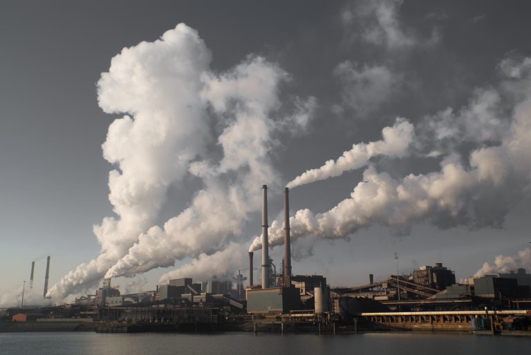 Air pollution smoke coming out of factories