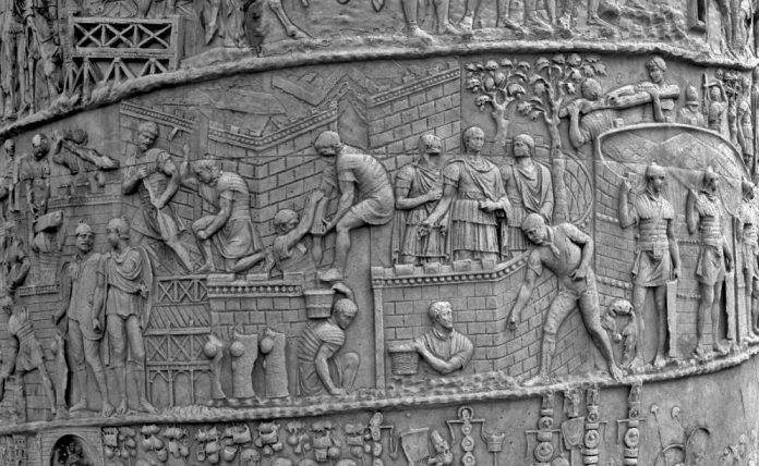 Fig. 2: Trajan's column in Rome, showing Roman soldiers constructing a perfect wall during the war against the Dacians, which emphasizes technical superiority.