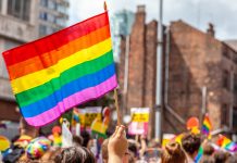 Pride parade flags with beautiful rainbow colors