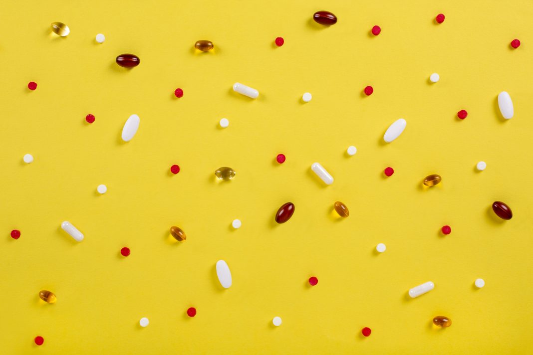 Pills On Yellow Background, symbolising drug repositioning
