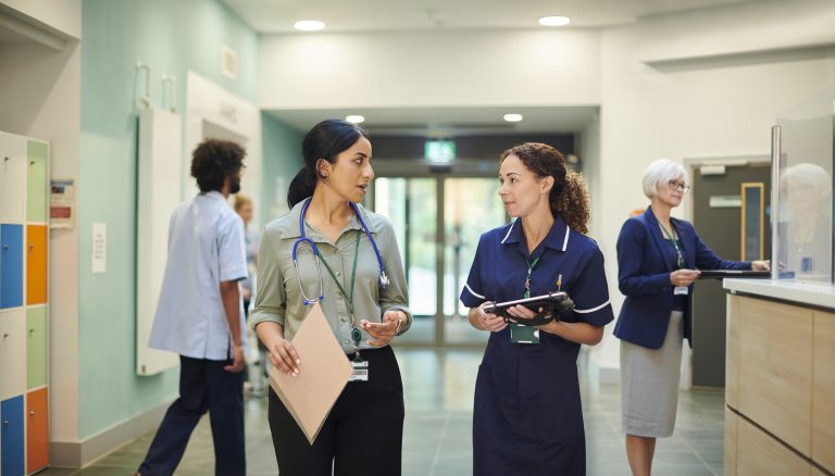 female doctor with hospital ward sister