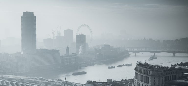 rooftop view over London on a foggy day from St Paul's cathedral, UK