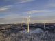 Wind power stations in a winter landscape in the Lapland province in north of Sweden above the polar circle.