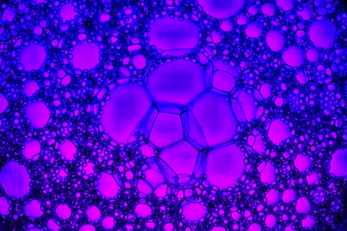 Soap bubbles on a pink background,Texture background.