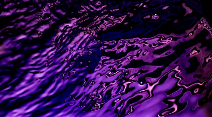 blue water mirror. abstract background of rippled water surface