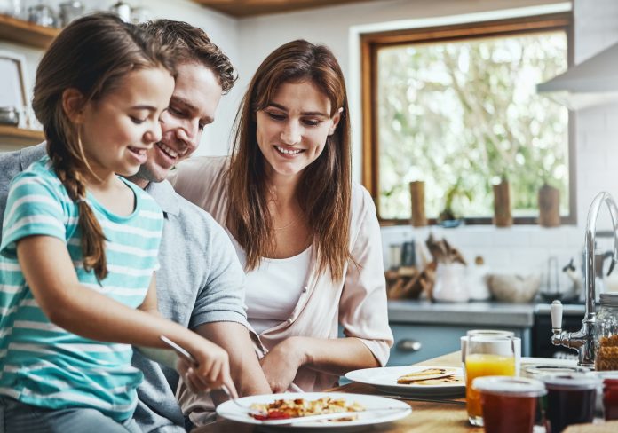 Shot of a family having breakfast together at home