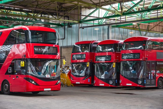 Double-decker buses at garage around Hackney in East London