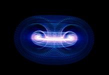 High Energy Particles Flow Through A Tokamak Or Doughnut-Shaped Device. Antigravity, Magnetic Field, Nuclear Fusion, Gravitational Waves And Spacetime Concept