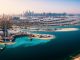 The Palm island panorama with Dubai marina in the background aerial