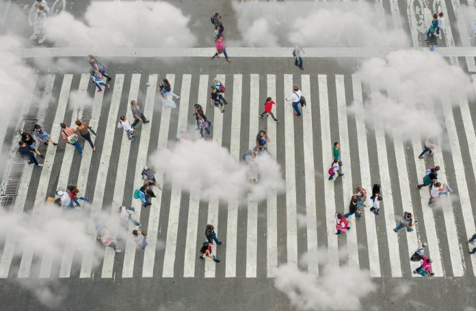 Aerial view of crowd with clowds, weather