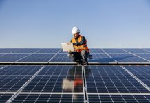 Man working on a solar panel