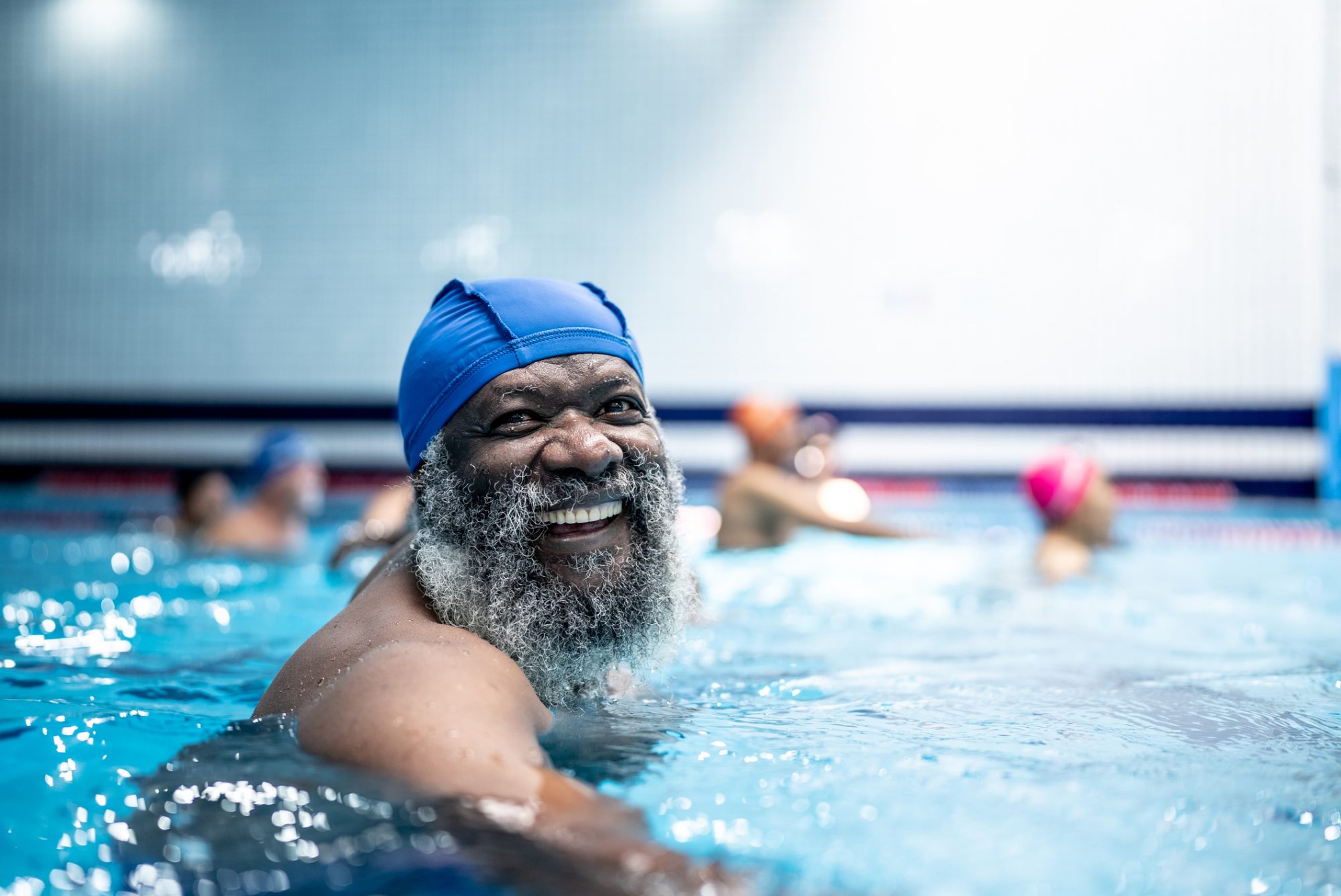 Portrait of a senior man at swimming pool