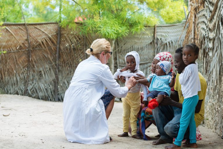 Medical exam of African family