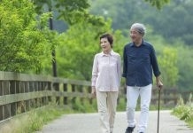 An old couple walking in the park, elderly people, primary care