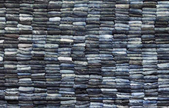 Jeans on a stack, textile, clothing