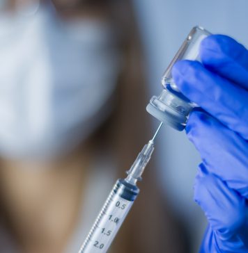 Vaccine in researcher hands