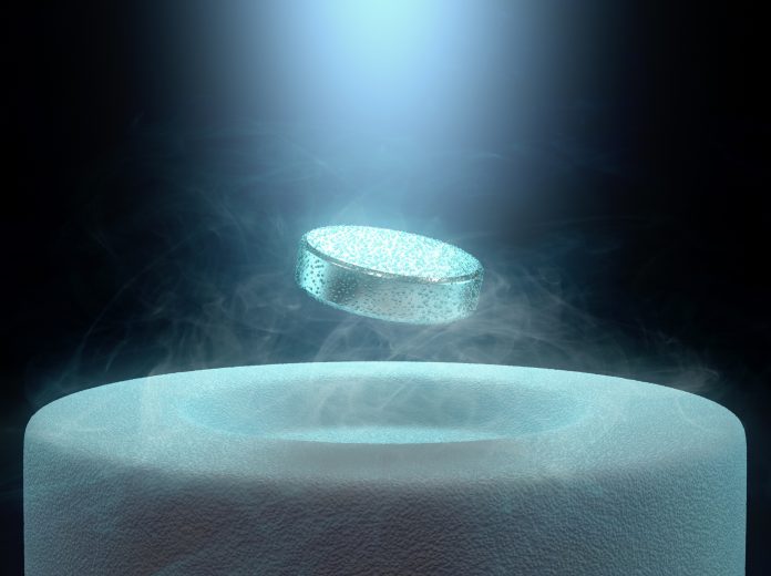 Magnet levitating above a high-temperature superconductor