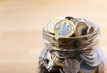 money pot on brown table