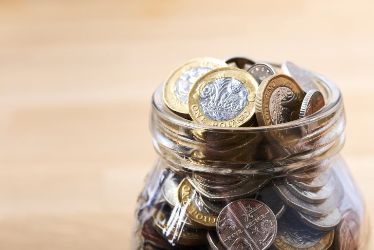 money pot on brown table