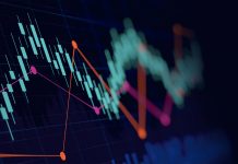 Abstract financial graph with up trend line candlestick chart in stock market on neon light colour background
