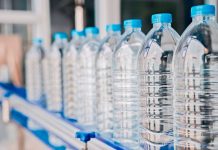 water bottles on an automated conveyor belt, Bottled water production line