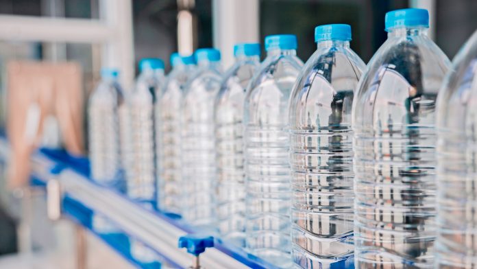 water bottles on an automated conveyor belt, Bottled water production line