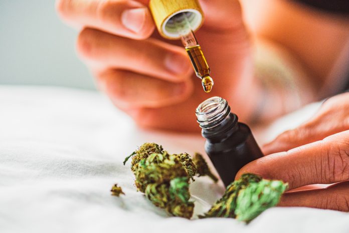 The use of cannabis as medicine has not been rigorously tested due to production and governmental restrictions, resulting in limited clinical research to define the safety and efficacy of using cannabis to treat diseases. Here's some CBD oil with a pipette