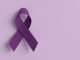 purple violet color ribbon bow symbol decoration ornament copy space background wallpaper awareness world cancer health campaign support disease illness hope help survivor flight treatment medical feb