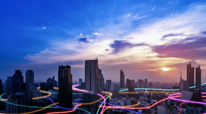 Smart city with speed line glowing light trail surround the city. big data connection technology concept, It business value