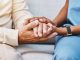 Nurse, hands and senior patient in empathy, safety and support of help, trust and healthcare consulting. Nursing home, counseling and gratitude for medical caregiver, client and hope in consultation