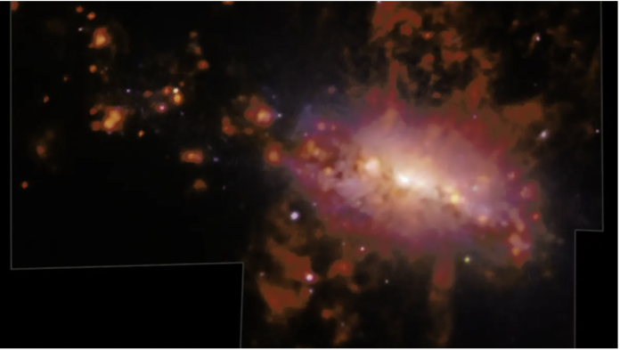 The galaxy NGC 4383 evolves as gas flows from its core at tremendous speeds. (Image credit: ESO/A. Watts et al.)