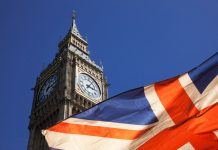 brexit concept - double exposure of flag and Westminster Palace with Big Ben