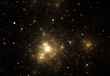 Close-up of shiny nebula with surrounding stars in galaxy