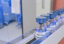 Vaccine Coronavirus COVID-19 on Conveyor Belt