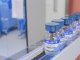 Vaccine Coronavirus COVID-19 on Conveyor Belt