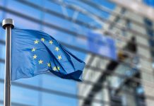 European Union flag against European Parliament