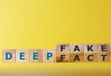 Dice form the words DEEPFAKE on wooden cube block. Deepfake concept matching facial movements.