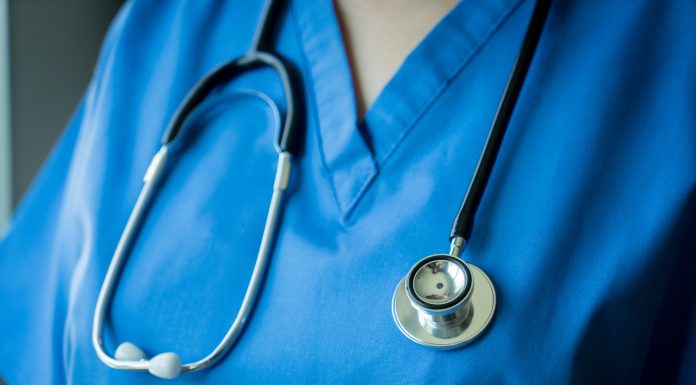Stethoscope on nurse & doctor coat backgroundStethoscope on nurse & doctor coat background: SONY A7