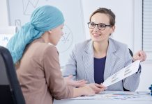 Doctor showing a chart to a patient