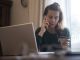 The woman who thinks she has been scammed while shopping online. She is calling the bank.