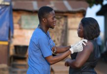 africa-humanitarian-aid-doctor-taking-care-patient