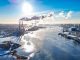 On the left is an aerial view of Halifax Harbour with a local power plant, as indicated by the three cooling towers. Credit: Noah James Media